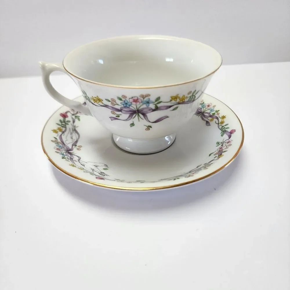 A Teleflora Gift Fine Porcelain Tea Cup and Saucer